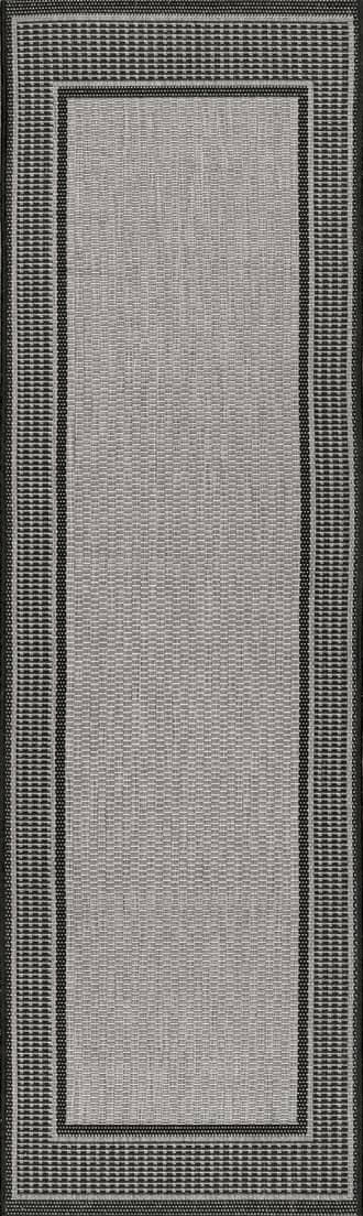 2' 3" x 7' 10" Monochrome Bordered Indoor/Outdoor Rug primary image