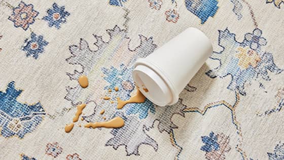 Spilled coffee beads up on a stain resistant washable rug.