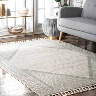 Beige Sandscript Tarnished Medallion Tassel rug