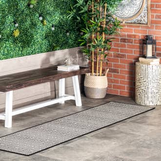 Black Tucana Birdseye Striped Indoor/Outdoor rug