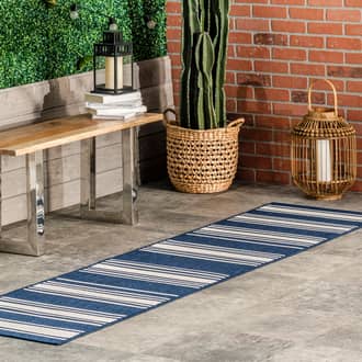 Navy Lauren Liess x Romy Striped Indoor/Outdoor rug