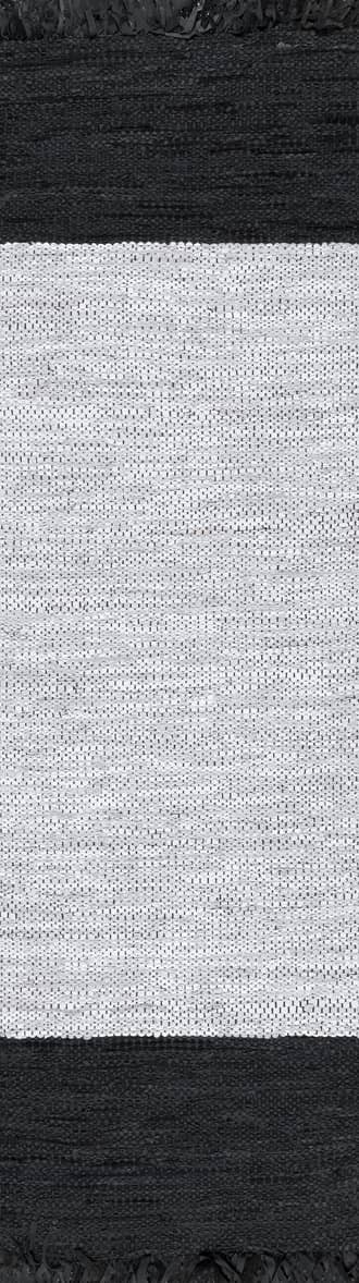2' 6" x 8' Bordered Leather Tassel Rug primary image
